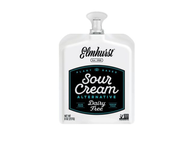 container of sour cream on a white background