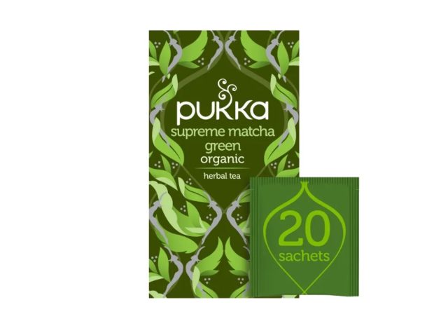 green box of Pukka matcha tea on a white background