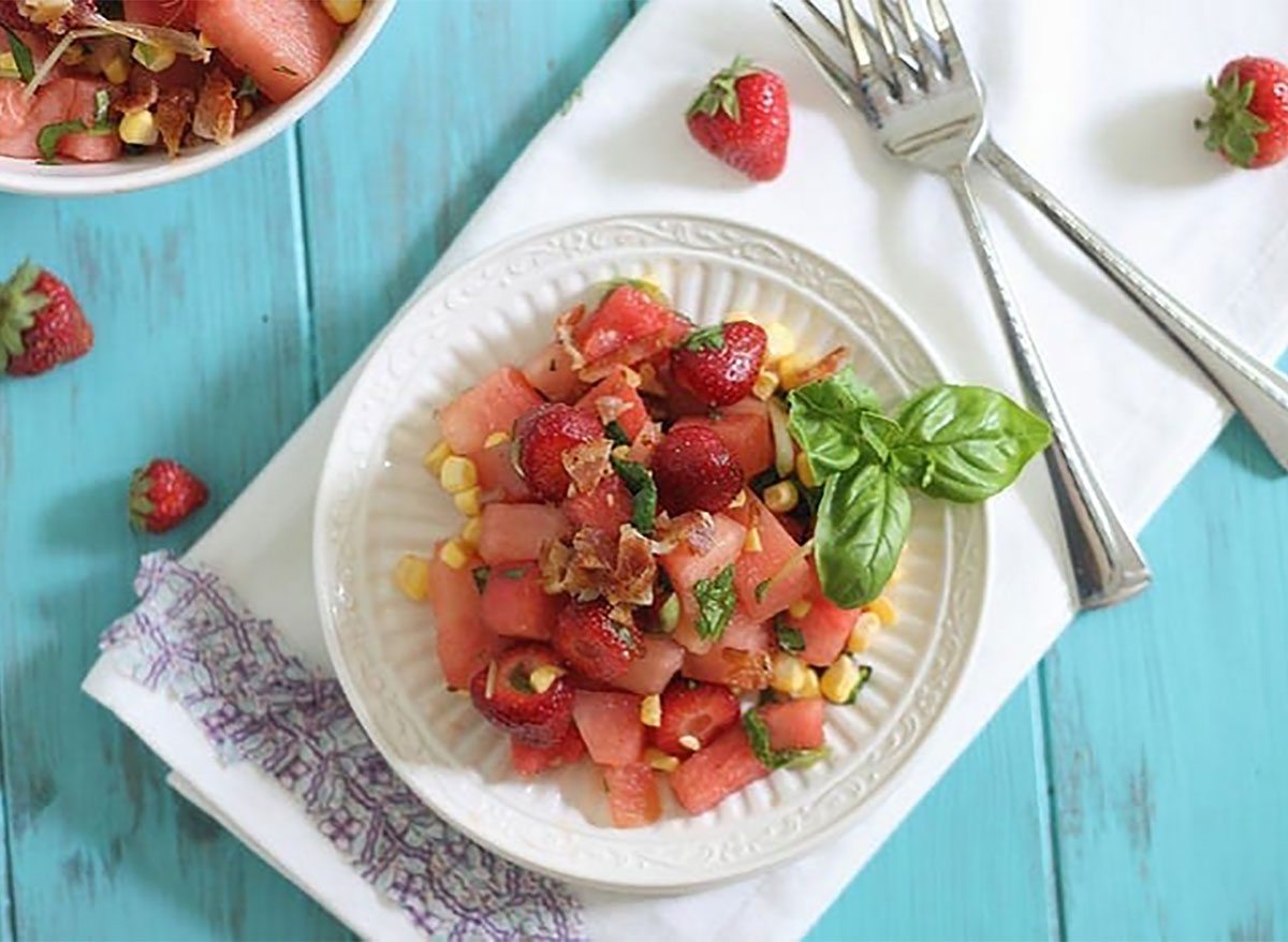 watermelon bacon salad on white plate